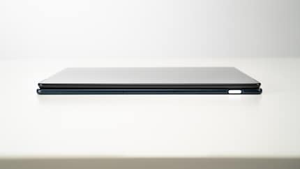 They are very similar on the outside. The Slate also has a fingerprint sensor on the power button.