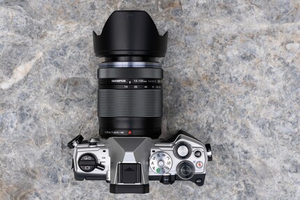 The OM System OM-5 has both dials on top of the camera. I can reach them easily, and they feel good. Having the On button on the left, on the other hand, is impractical, in my opinion.